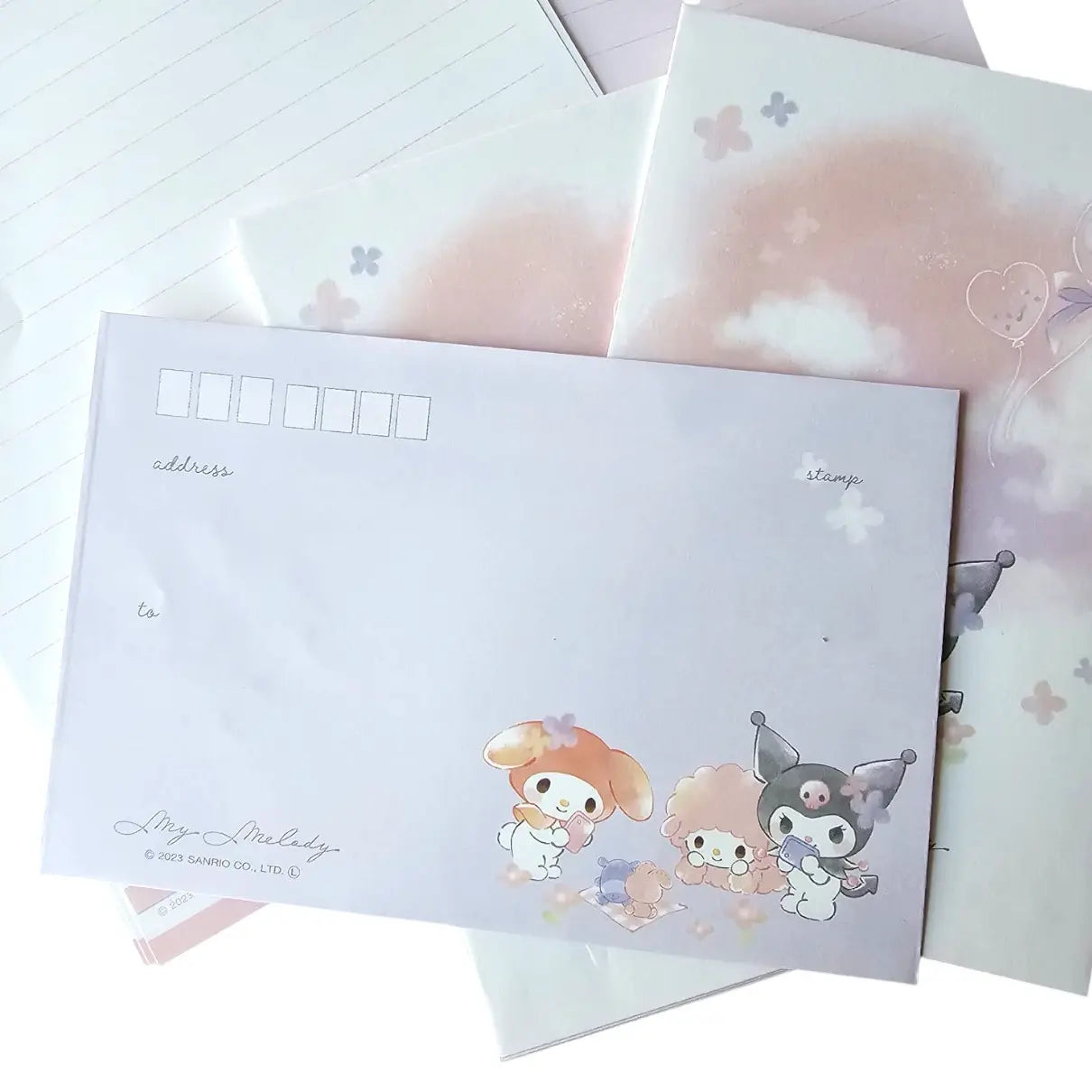 set de cartas y sobres sanrio (28 hojas / 14 sobres)