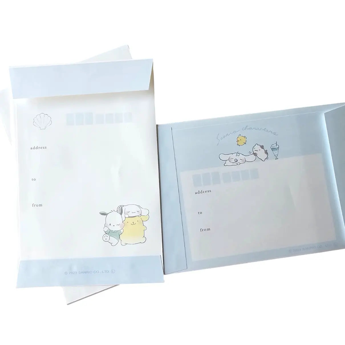 set de cartas y sobres sanrio (28 hojas / 14 sobres)